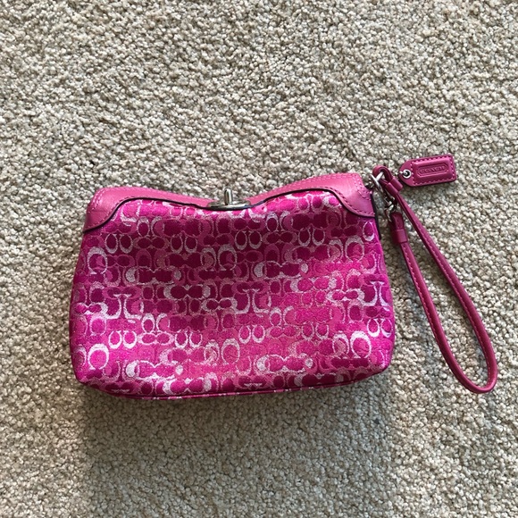 Coach Handbags - Fuschia Coach wristlet